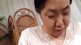 Mature Japanese Granny masturbates